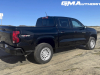2023-chevrolet-colorado-wt-work-truck-black-gba-first-drive-exterior-009-side-rear-three-quarters