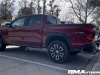 2023-chevrolet-colorado-z71-radiant-red-tintcoat-gnt-first-drive-march-2023-exterior-003-side