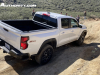 2023-chevrolet-colorado-z71-summit-white-gaz-offroad-first-drive-exterior-003-side-rear-three-quarters