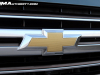 2023-chevrolet-suburban-gma-garage-high-country-lm2-duramax-diesel-silver-sage-metallic-g6n-exterior-078-gold-chevy-bowtie-logo-on-grille
