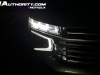 2023-chevrolet-suburban-high-country-gma-garage-night-time-lights-exterior-018-headlight-with-drl-daytime-running-light