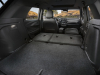 2023-chevrolet-trailblazer-activ-jet-black-with-arizona-accents-and-leatherette-seat-trim-interior-006-rear-hatch-second-row-seats-folded-passenger-seat-folded