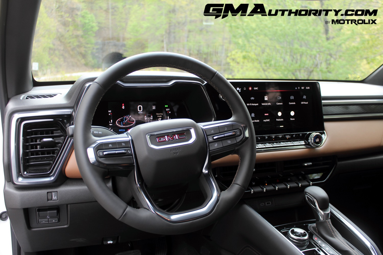 2023-gmc-canyon-at4-jet-black-with-timber-hx6-first-drive-interior-013-cockpit-digital-instrument-panel-gauge-cluster-infotainment-display-screen-center-stack-center-console