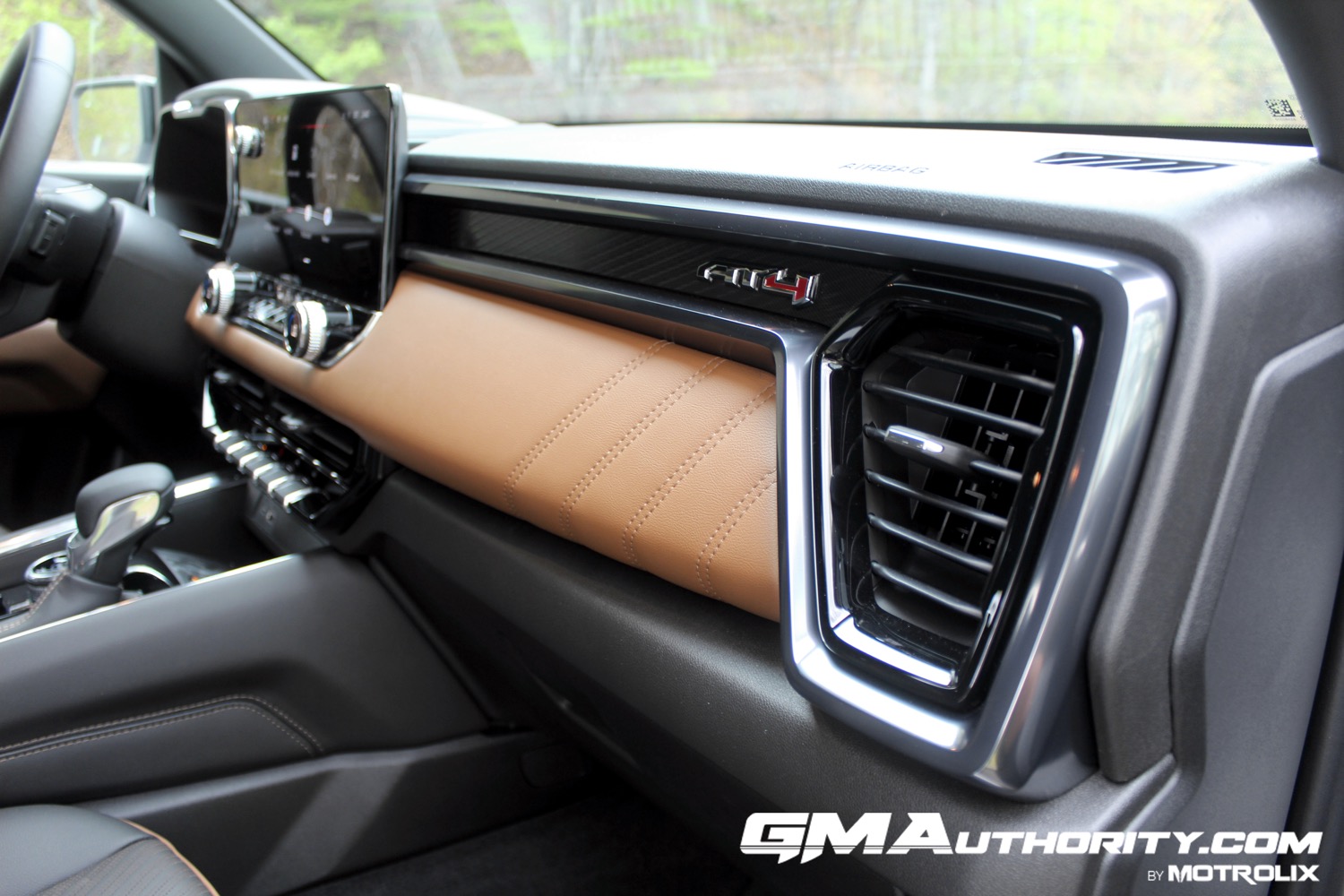 2023-gmc-canyon-at4-jet-black-with-timber-hx6-first-drive-interior-021-dash-detail-ac-vent