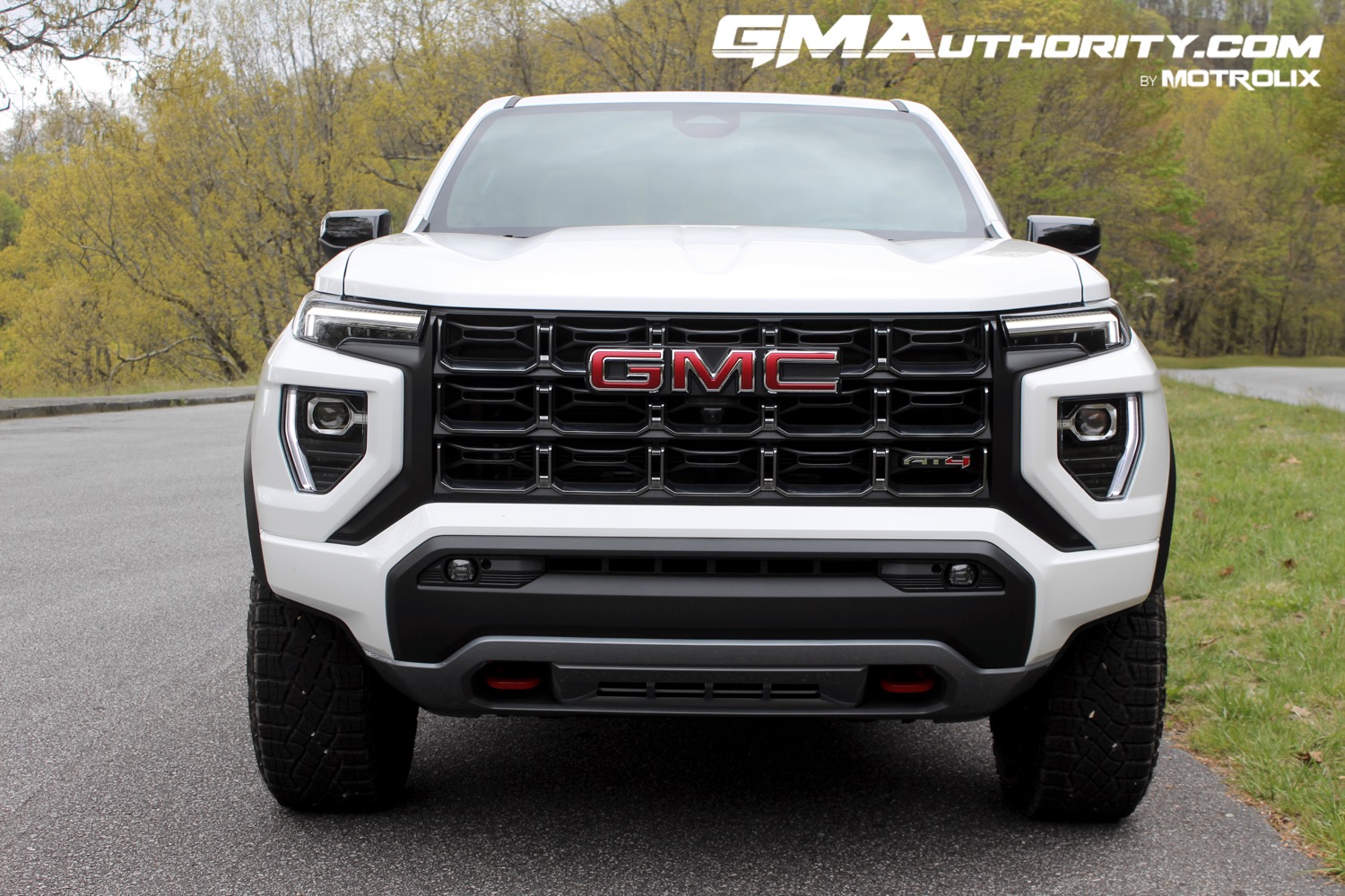 2023-gmc-canyon-at4-summit-white-gaz-first-drive-exterior-002-front