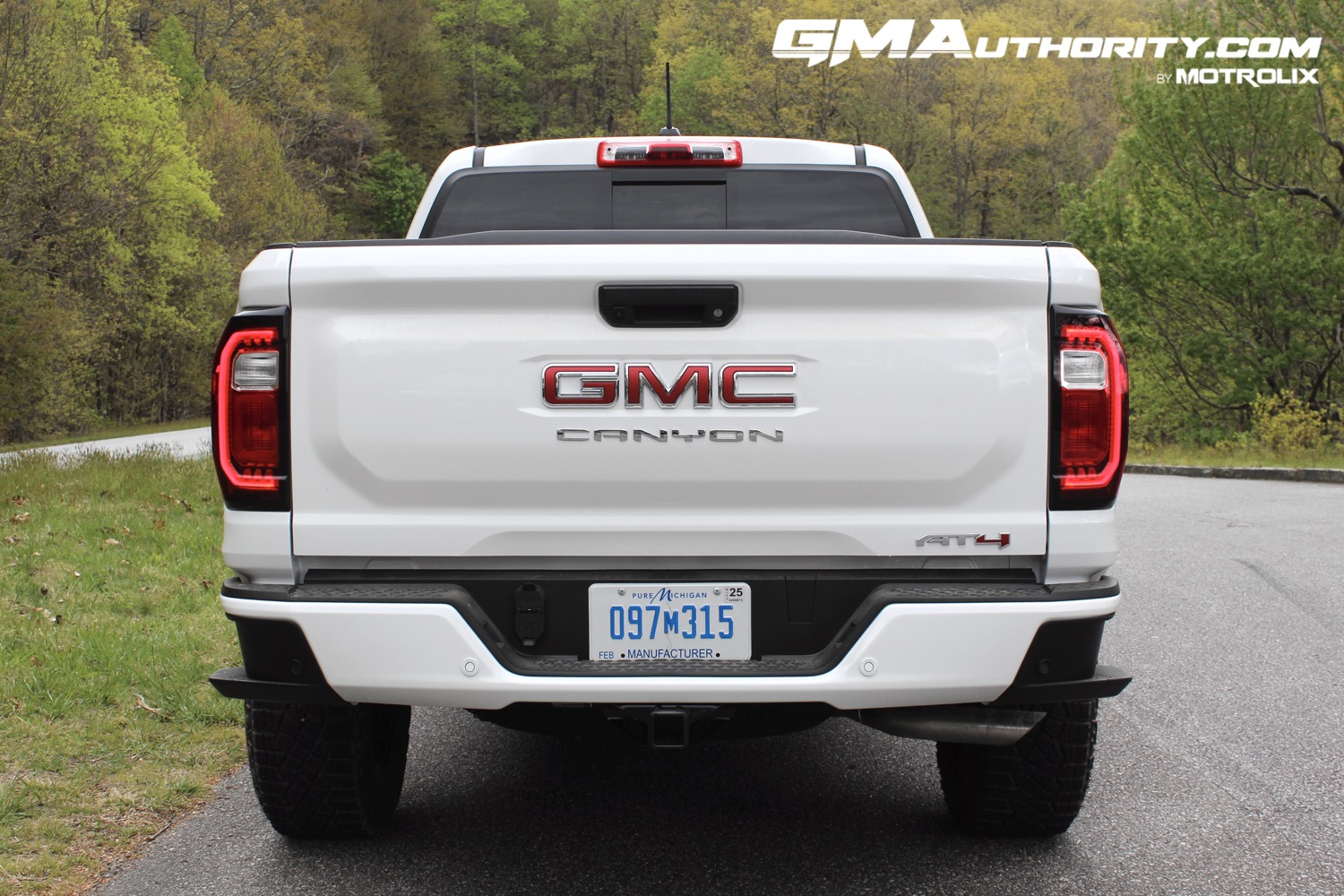 2023-gmc-canyon-at4-summit-white-gaz-first-drive-exterior-013-rear