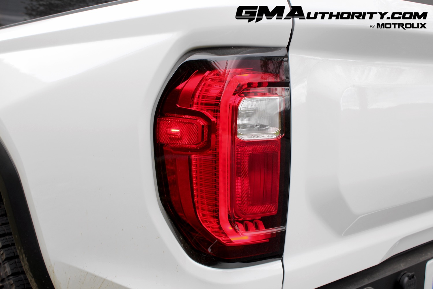 2023-gmc-canyon-at4-summit-white-gaz-first-drive-exterior-056-tail-light