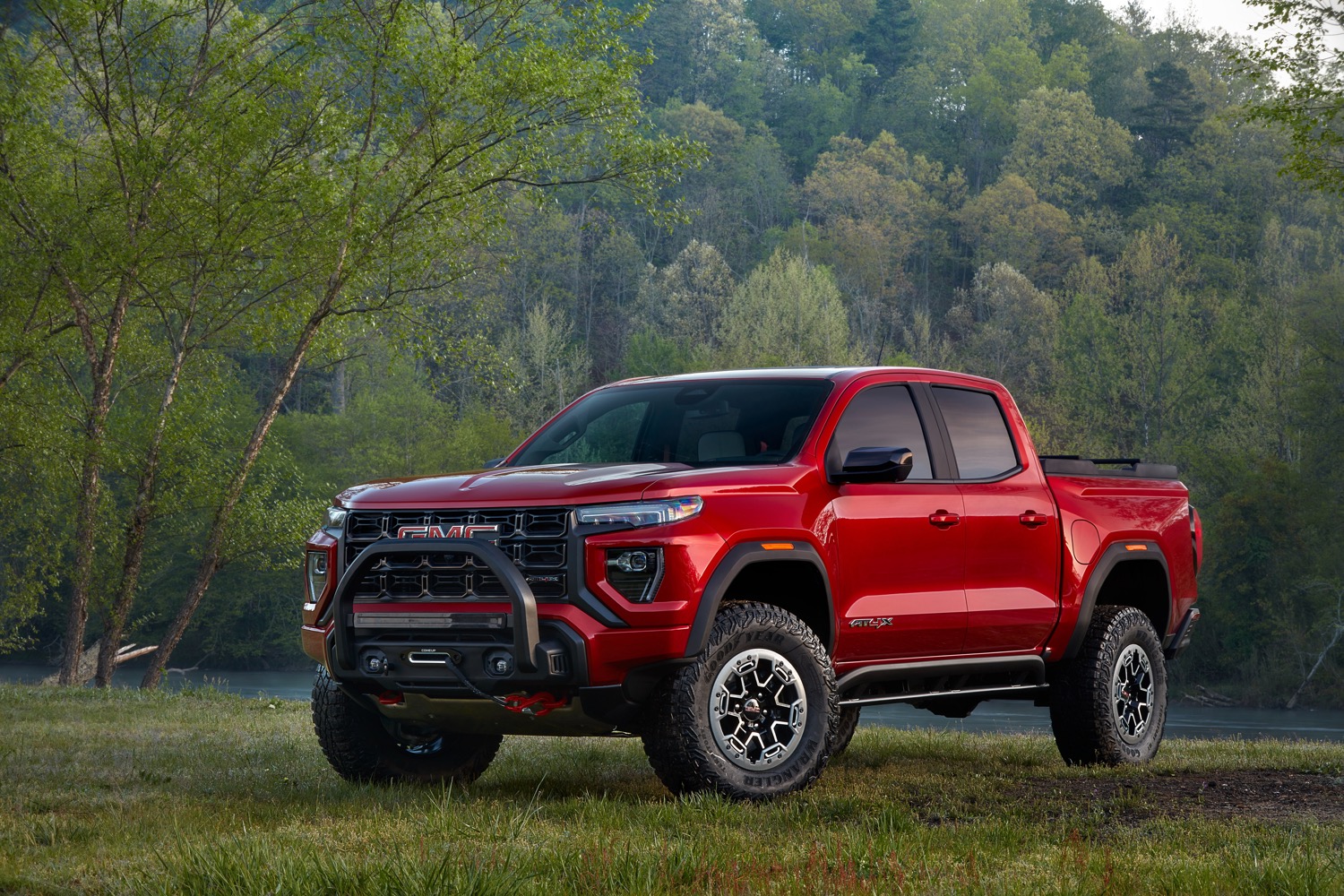 2023-gmc-canyon-at4x-edition-1-first-media-drive-exterior-001-side-front-three-quarters