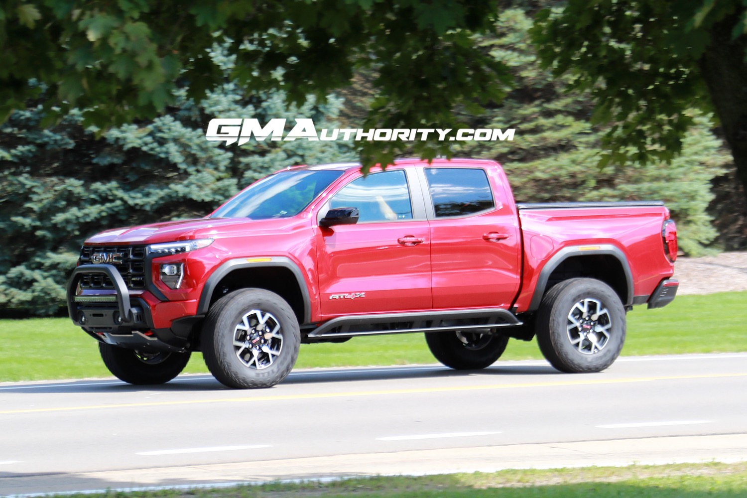 2023-gmc-canyon-at4x-volcanic-red-tintcoat-gnt-first-real-world-photos-october-2022-exterior-003