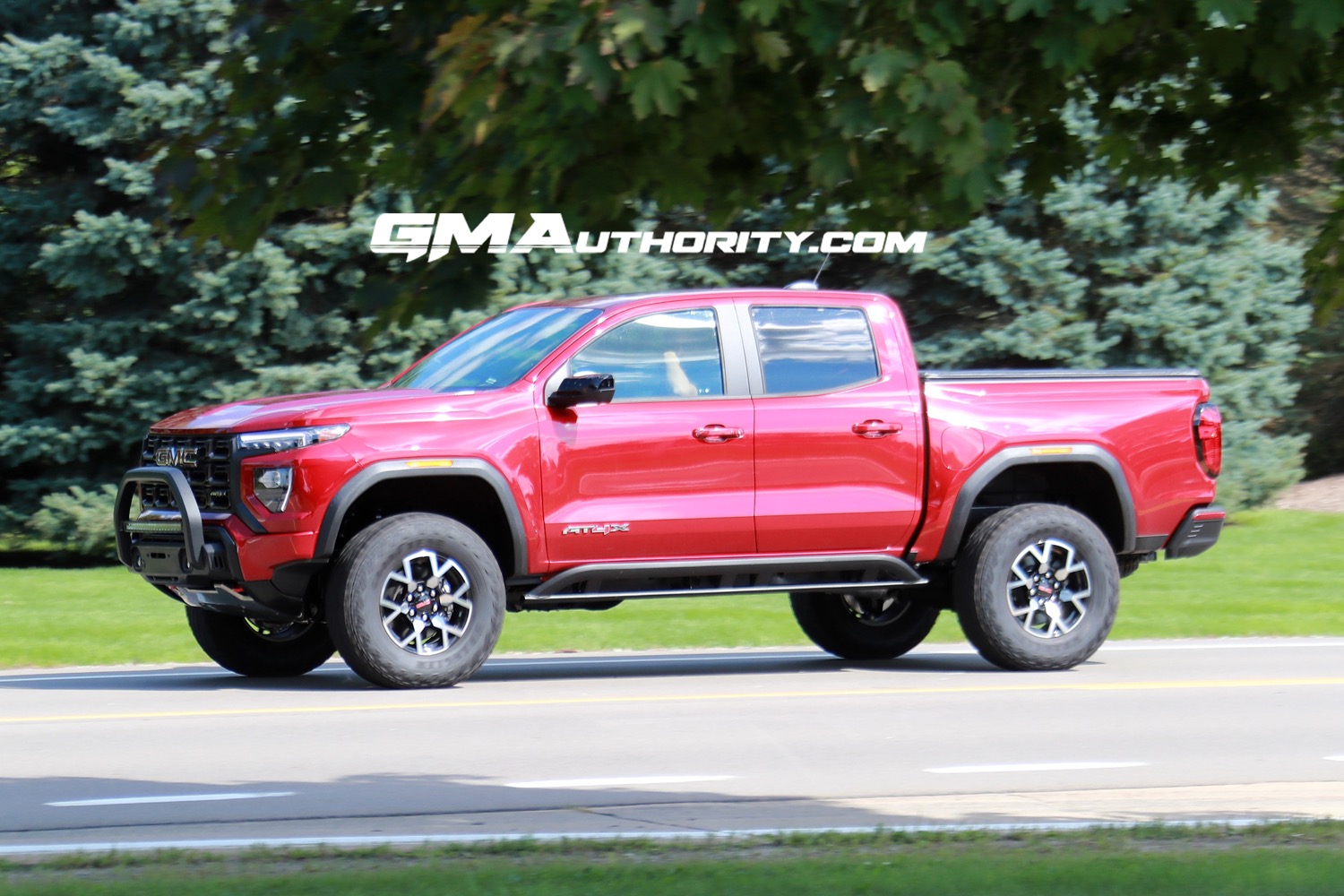 2023-gmc-canyon-at4x-volcanic-red-tintcoat-gnt-first-real-world-photos-october-2022-exterior-004