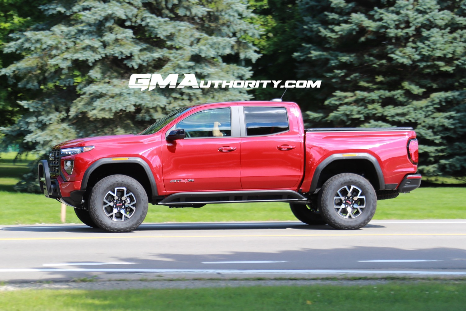 2023-gmc-canyon-at4x-volcanic-red-tintcoat-gnt-first-real-world-photos-october-2022-exterior-006