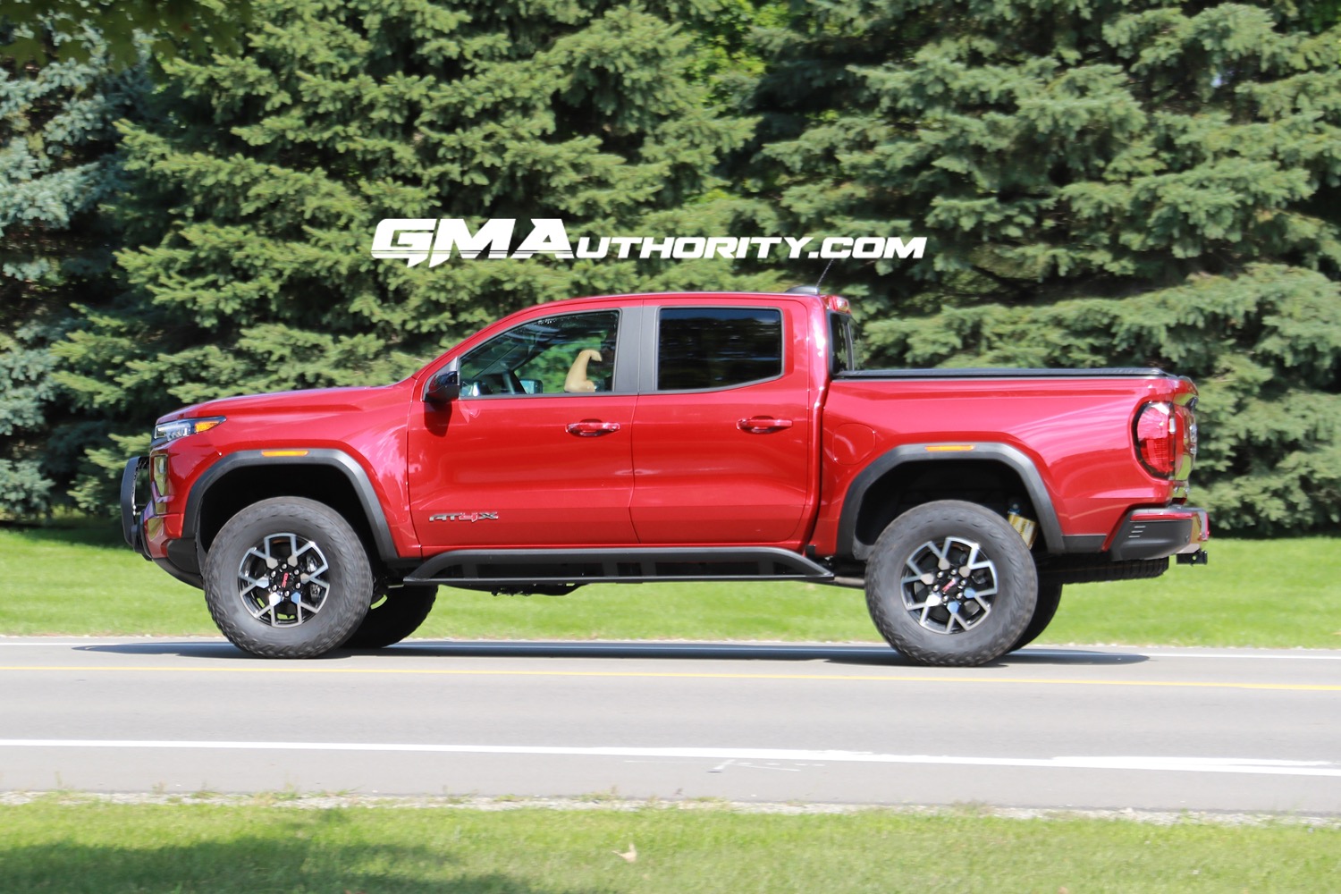 2023-gmc-canyon-at4x-volcanic-red-tintcoat-gnt-first-real-world-photos-october-2022-exterior-008