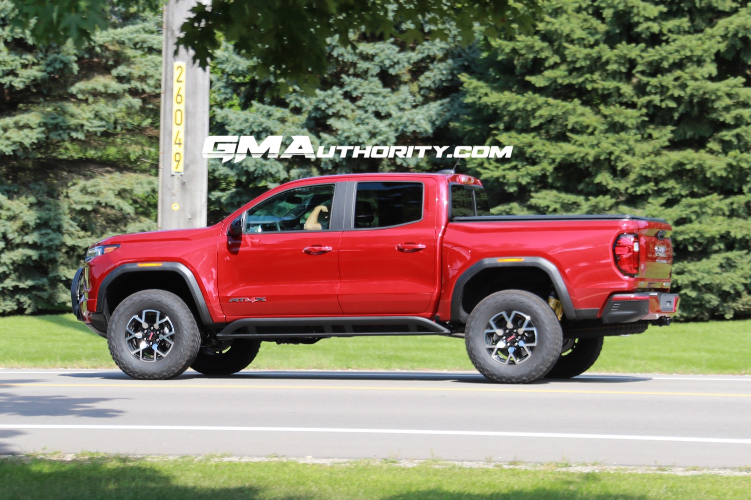 2023-gmc-canyon-at4x-volcanic-red-tintcoat-gnt-first-real-world-photos-october-2022-exterior-009