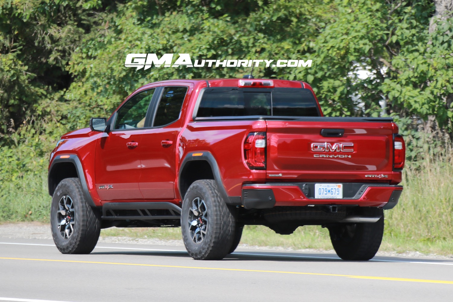 2023-gmc-canyon-at4x-volcanic-red-tintcoat-gnt-first-real-world-photos-october-2022-exterior-011
