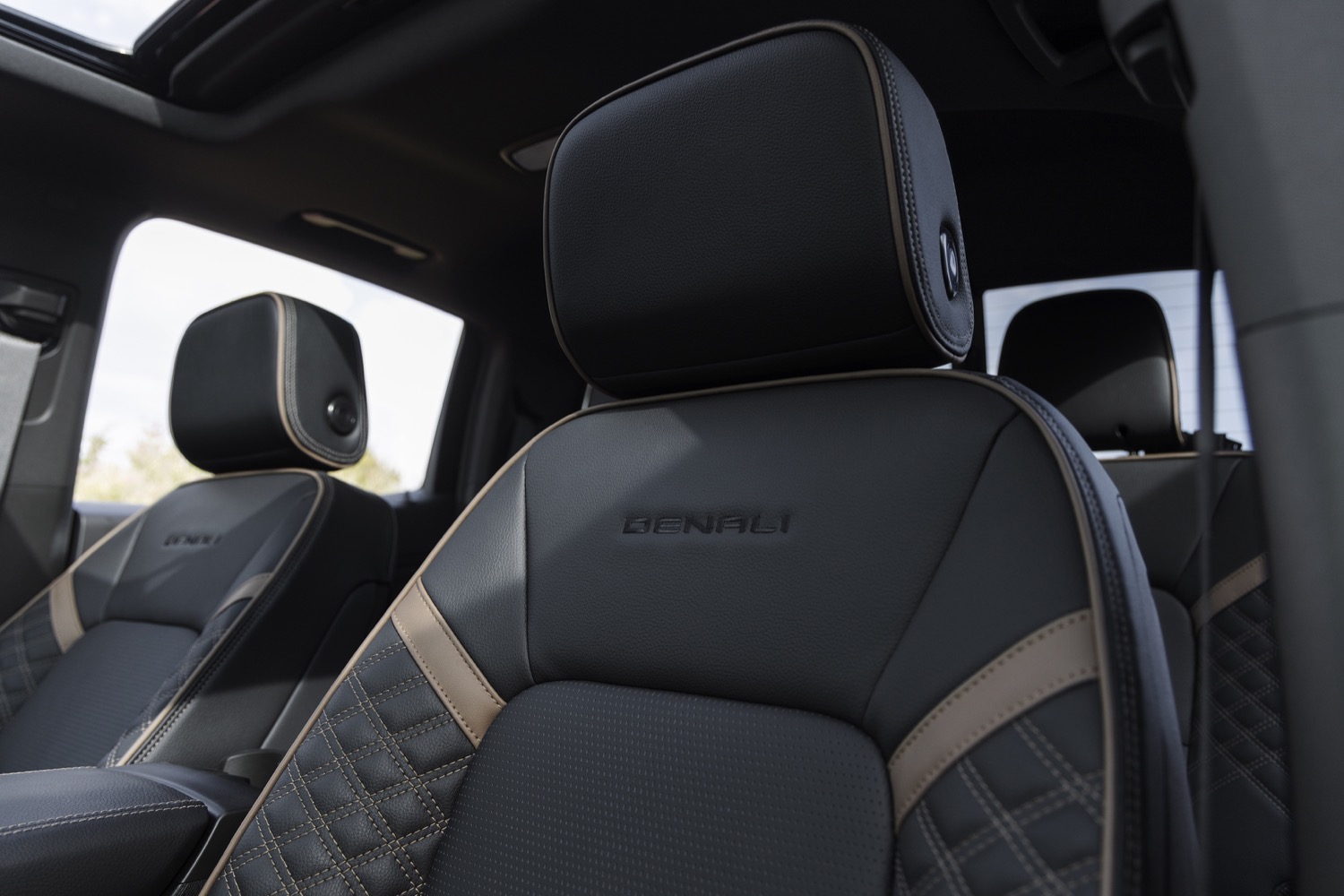 2023-gmc-canyon-denali-interior-006-drivers-seat-headrest-denali-logo