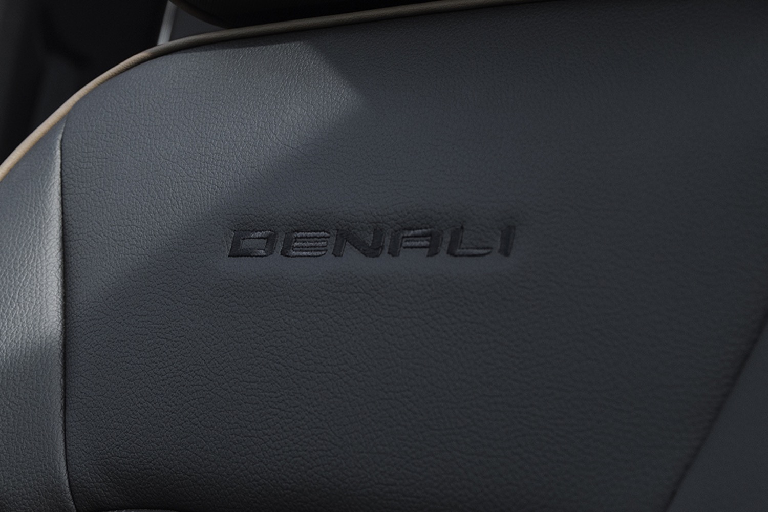 2023-gmc-canyon-denali-interior-007-seat-denali-logo