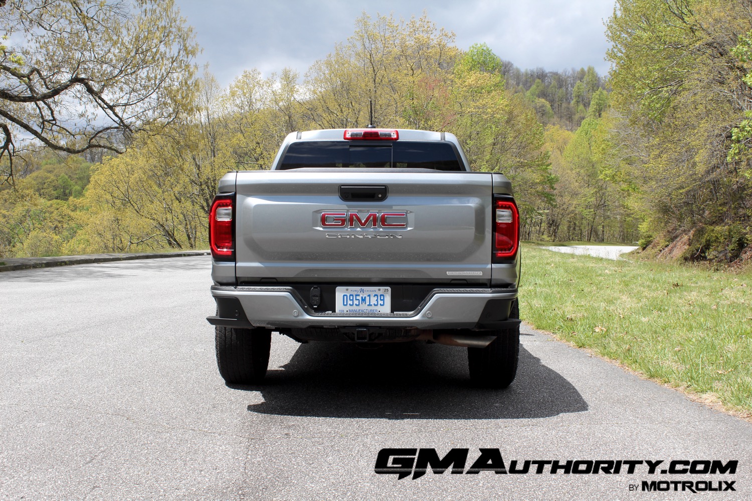 2023-gmc-canyon-elevation-sterling-metallic-gxd-first-drive-exterior-010-rear