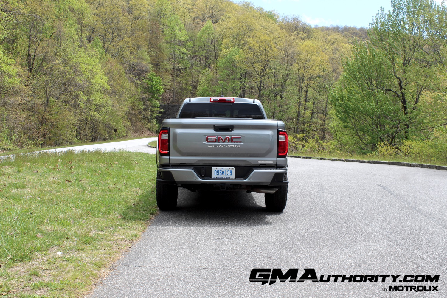 2023-gmc-canyon-elevation-sterling-metallic-gxd-first-drive-exterior-012-rear