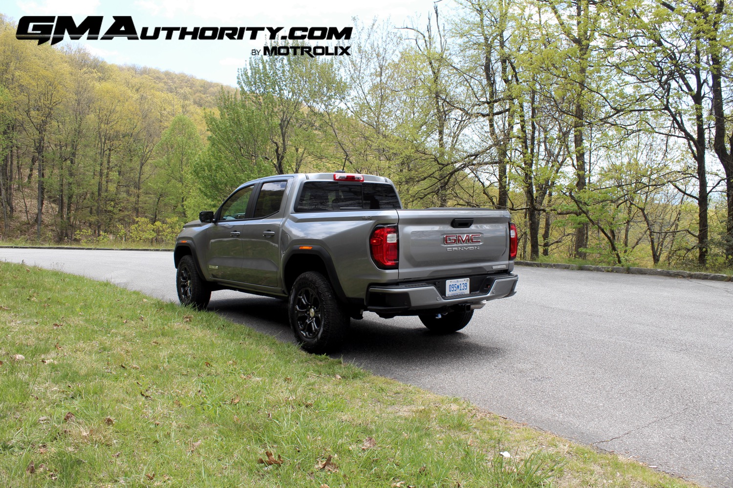 2023-gmc-canyon-elevation-sterling-metallic-gxd-first-drive-exterior-014-rear-three-quarters