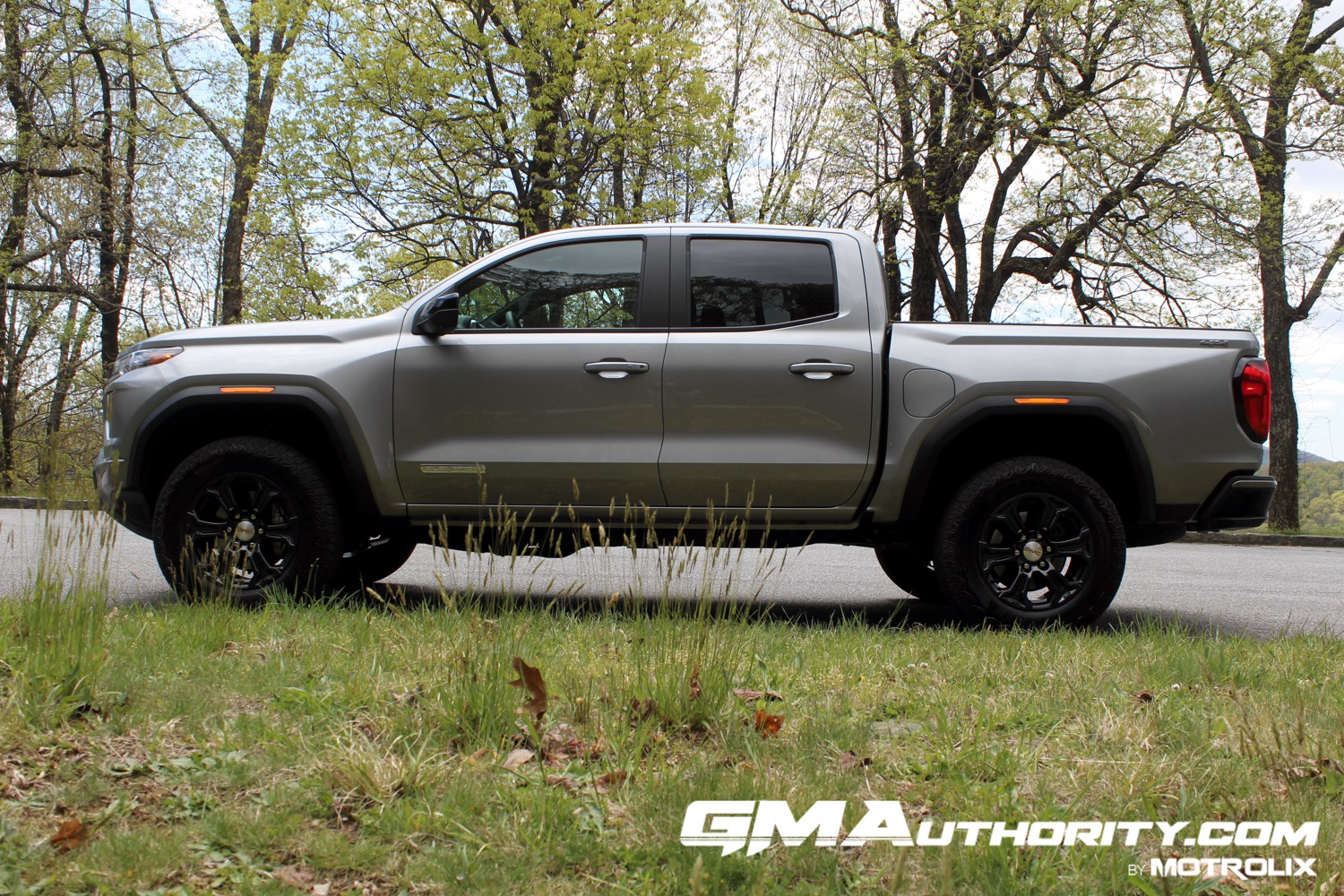 2023-gmc-canyon-elevation-sterling-metallic-gxd-first-drive-exterior-017-side