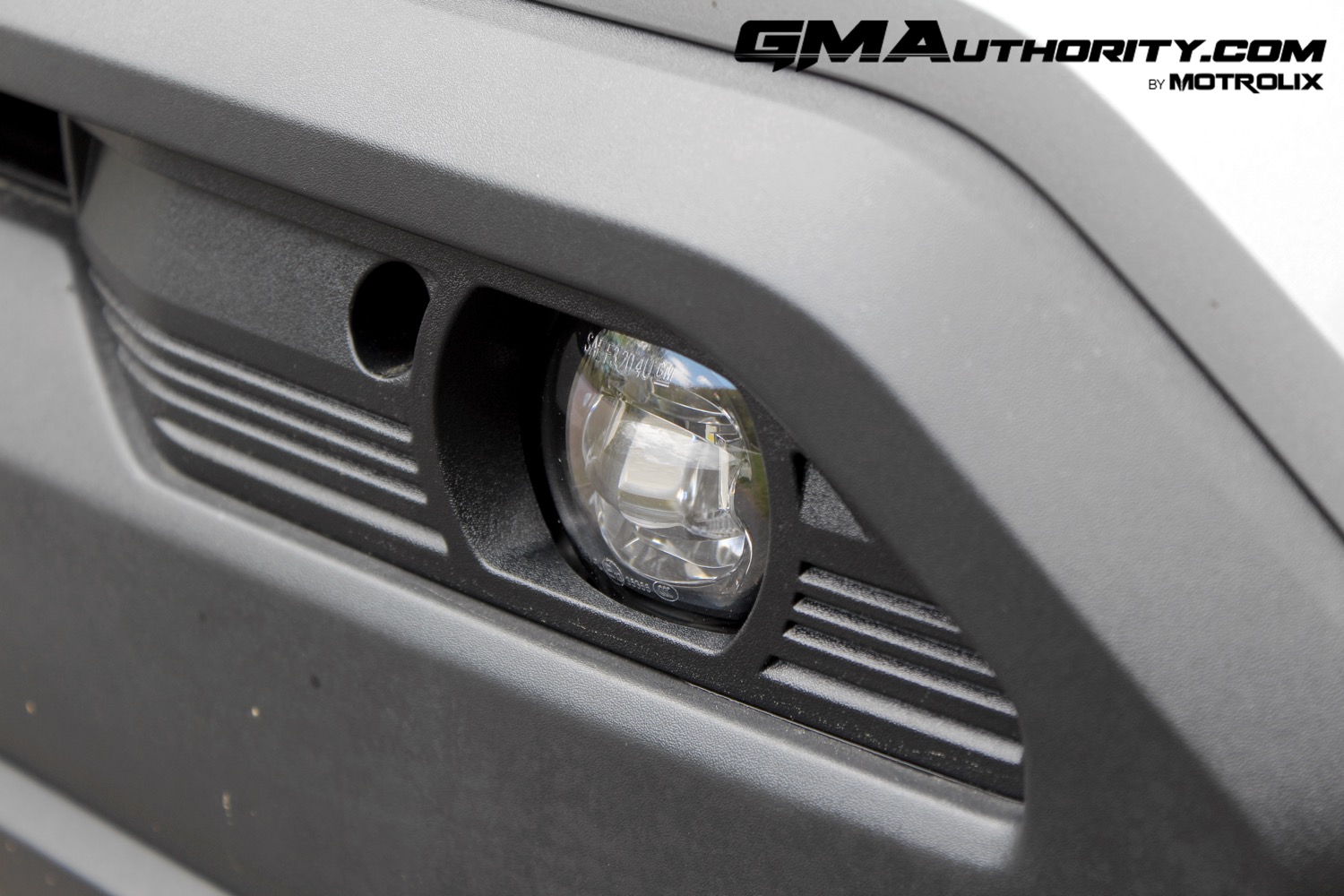 2023-gmc-canyon-elevation-sterling-metallic-gxd-first-drive-exterior-037-fog-light