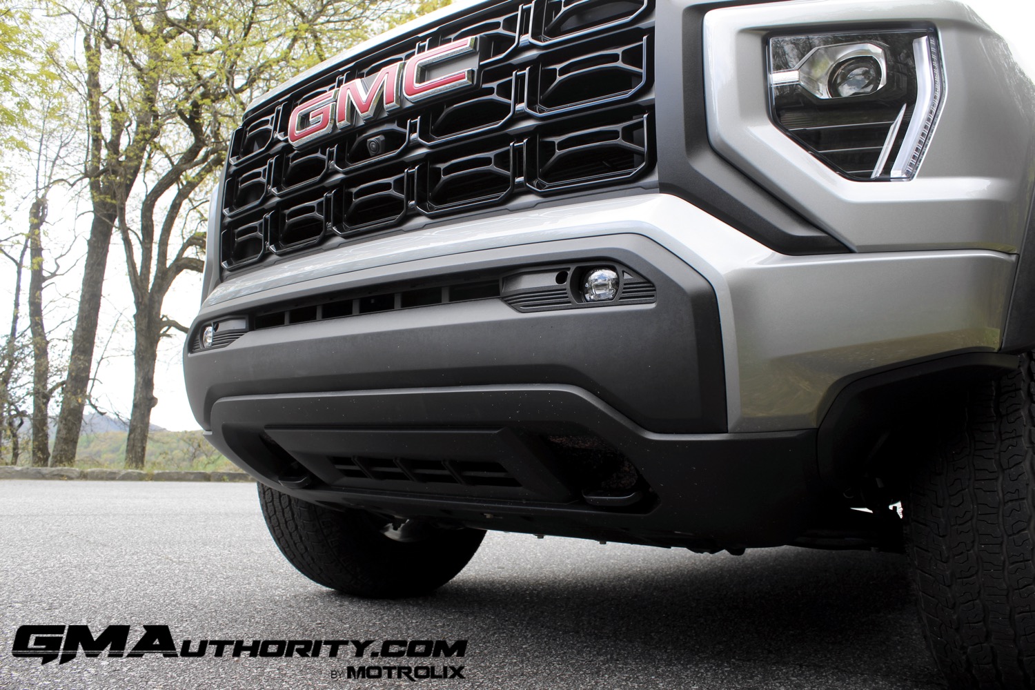 2023-gmc-canyon-elevation-sterling-metallic-gxd-first-drive-exterior-038-front-bumper-fog-lights