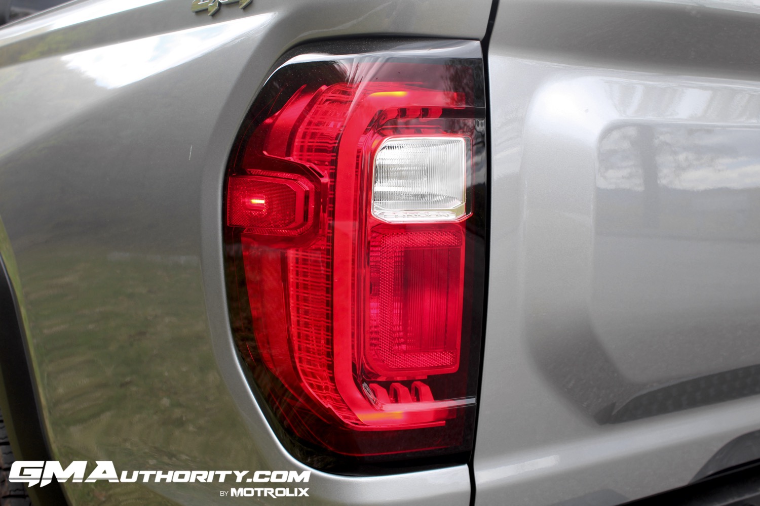 2023-gmc-canyon-elevation-sterling-metallic-gxd-first-drive-exterior-066-tail-light-detail