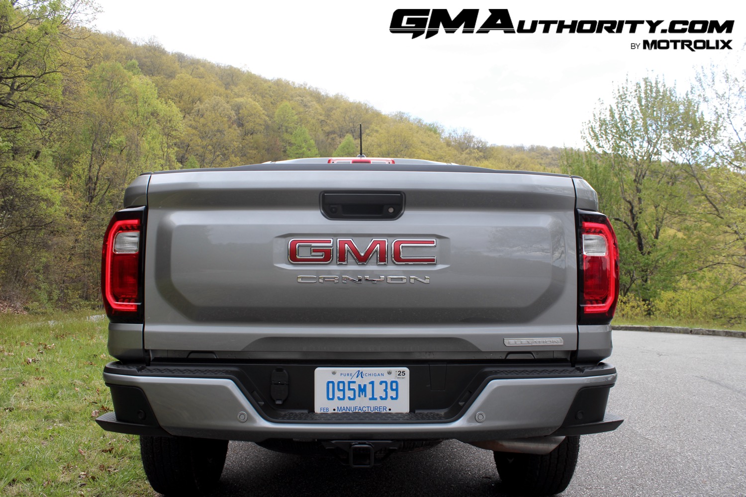 2023-gmc-canyon-elevation-sterling-metallic-gxd-first-drive-exterior-074-gmc-logo-badge-on-tailgate