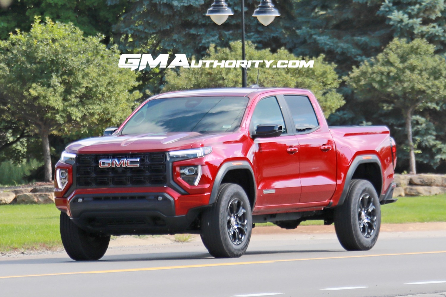 2023-gmc-canyon-elevation-volcanic-red-tintcoat-gnt-first-photos-august-2022-exterior-001