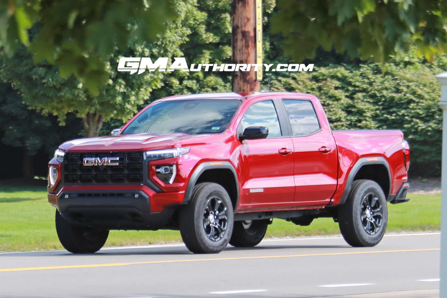 2023-gmc-canyon-elevation-volcanic-red-tintcoat-gnt-first-photos-august-2022-exterior-002