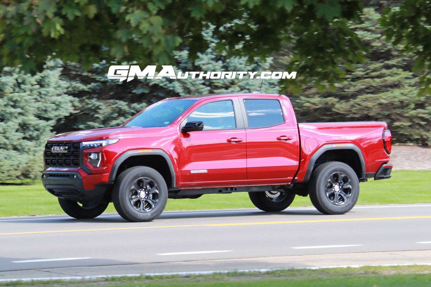 2023-gmc-canyon-elevation-volcanic-red-tintcoat-gnt-first-photos-august-2022-exterior-004