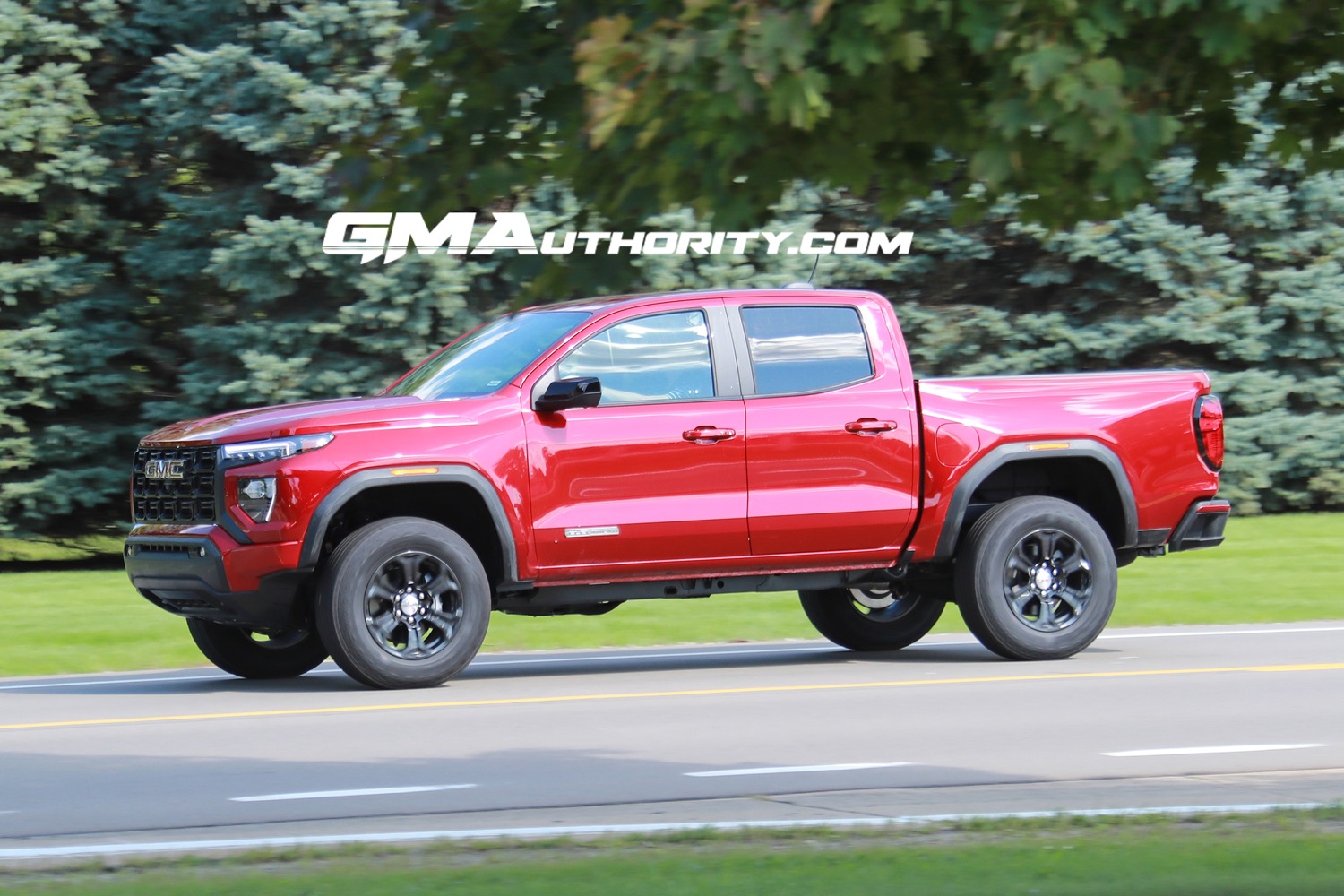 2023-gmc-canyon-elevation-volcanic-red-tintcoat-gnt-first-photos-august-2022-exterior-005