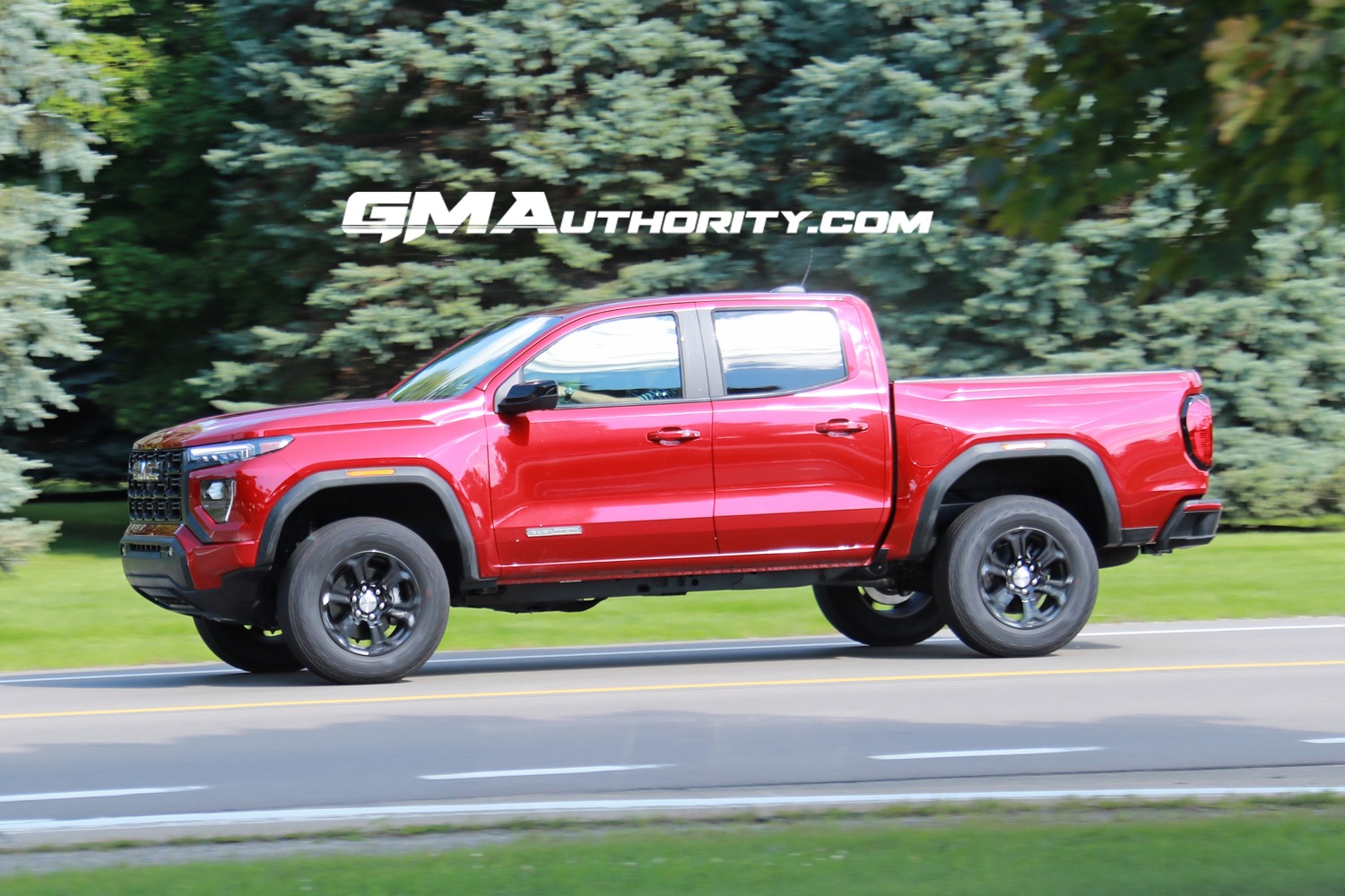 2023-gmc-canyon-elevation-volcanic-red-tintcoat-gnt-first-photos-august-2022-exterior-006