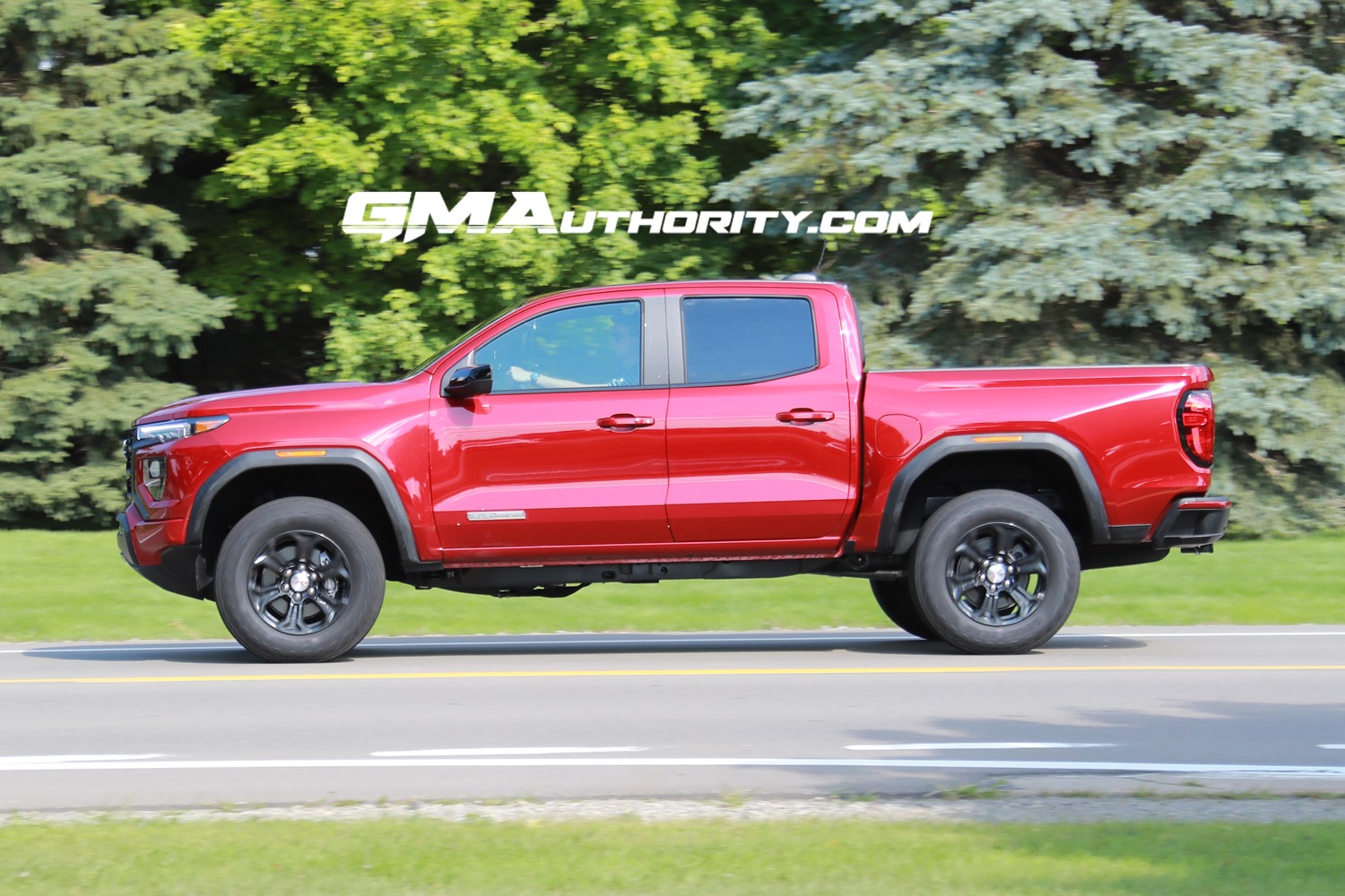 2023-gmc-canyon-elevation-volcanic-red-tintcoat-gnt-first-photos-august-2022-exterior-007