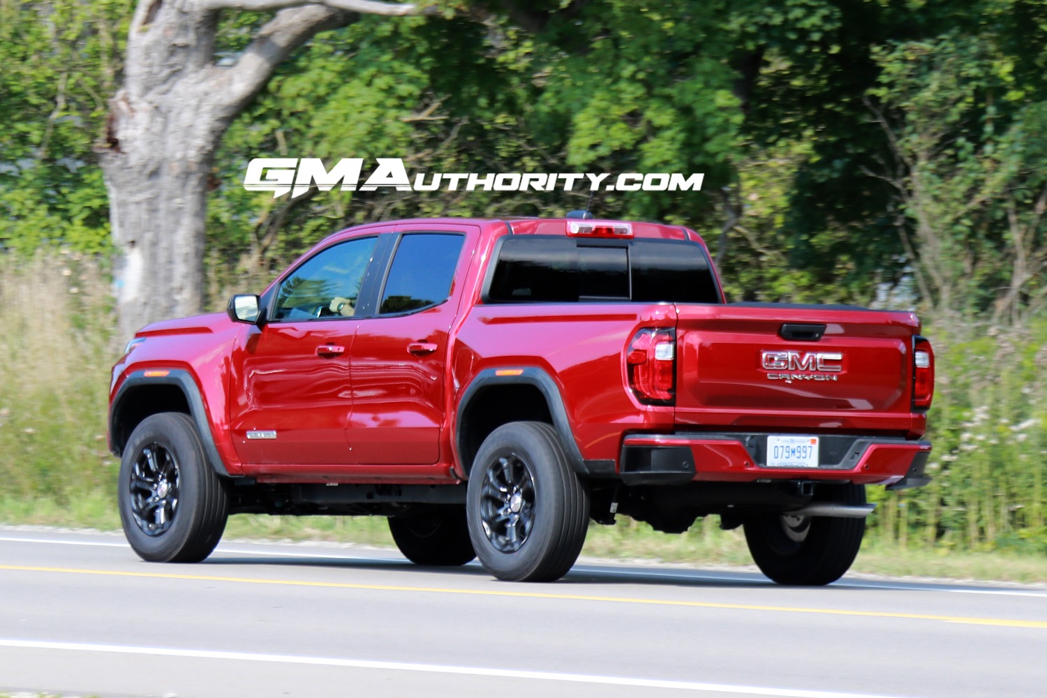 2023-gmc-canyon-elevation-volcanic-red-tintcoat-gnt-first-photos-august-2022-exterior-011