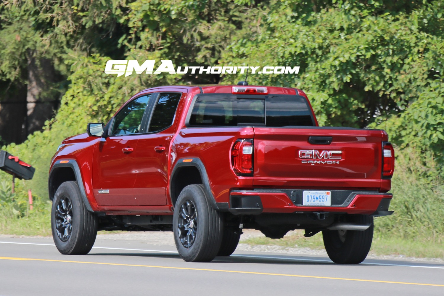 2023-gmc-canyon-elevation-volcanic-red-tintcoat-gnt-first-photos-august-2022-exterior-012