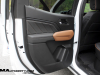 2023-gmc-canyon-at4-jet-black-with-timber-hx6-first-drive-interior-015-rear-door-panel-knee-rest-pad