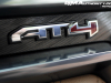 2023-gmc-canyon-at4-jet-black-with-timber-hx6-first-drive-interior-024-at4-logo-badge-on-dash