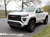2023-gmc-canyon-at4-summit-white-gaz-first-drive-exterior-003-front-three-quarters