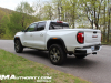2023-gmc-canyon-at4-summit-white-gaz-first-drive-exterior-009-side-rear-three-quarters