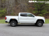 2023-gmc-canyon-at4-summit-white-gaz-first-drive-exterior-017-side