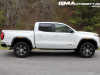 2023-gmc-canyon-at4-summit-white-gaz-first-drive-exterior-018-side