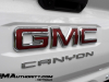 2023-gmc-canyon-at4-summit-white-gaz-first-drive-exterior-066-gmc-canyon-logo-badge-on-tailgate