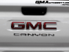 2023-gmc-canyon-at4-summit-white-gaz-first-drive-exterior-067-gmc-canyon-logo-badge-on-tailgate