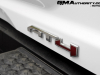 2023-gmc-canyon-at4-summit-white-gaz-first-drive-exterior-071-at4-logo-badge-on-tailgate