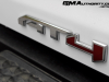 2023-gmc-canyon-at4-summit-white-gaz-first-drive-exterior-072-at4-logo-badge-on-tailgate