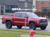 2023-gmc-canyon-at4-volcanic-red-tincoat-gnt-first-real-world-photos-exterior-002