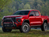 2023-gmc-canyon-at4x-edition-1-first-media-drive-exterior-002-side-front-three-quarters