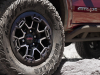2023-gmc-canyon-at4x-exterior-012-wheel-tire-goodyear-wrangler-mt-gmc-logo