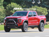 2023-gmc-canyon-at4x-volcanic-red-tintcoat-gnt-first-real-world-photos-october-2022-exterior-001